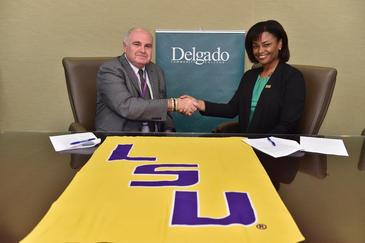 Dr. Demetrius Porche, dean of LSU Health New Orleans School of Nursing, and Joan Y. Davis, chancellor of Delgado Community College, are pictured at a ceremony to formalize a new transfer agreement between the nursing schools at their institutions.