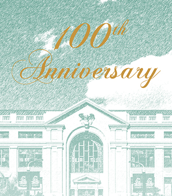 picture of isaac delgado hall with "100th anniversary" text