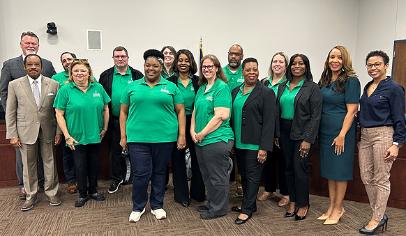 group photo of the team members at the LCTCS Board Meeting