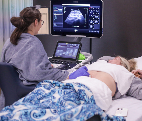 students taking an ultrasound