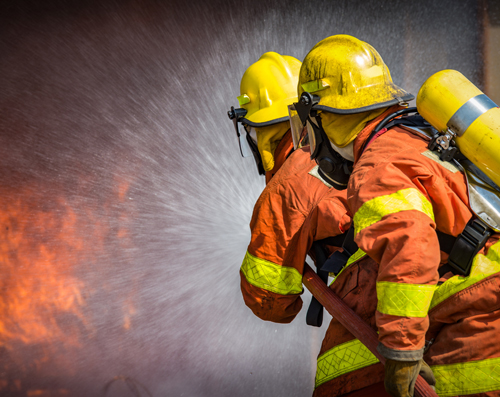 Firefighters putting out a fire