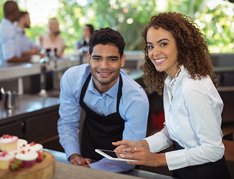 male bartender and female server