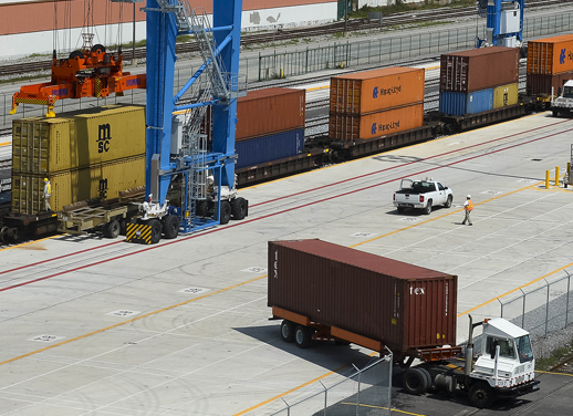 Port of New Orleans with a container loaded on a truck