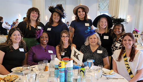 Members of the Charity School of Nursing Alumni Association pose for a photo.