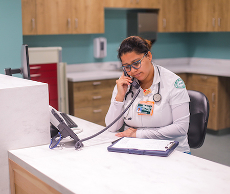 LPN students at the front desk