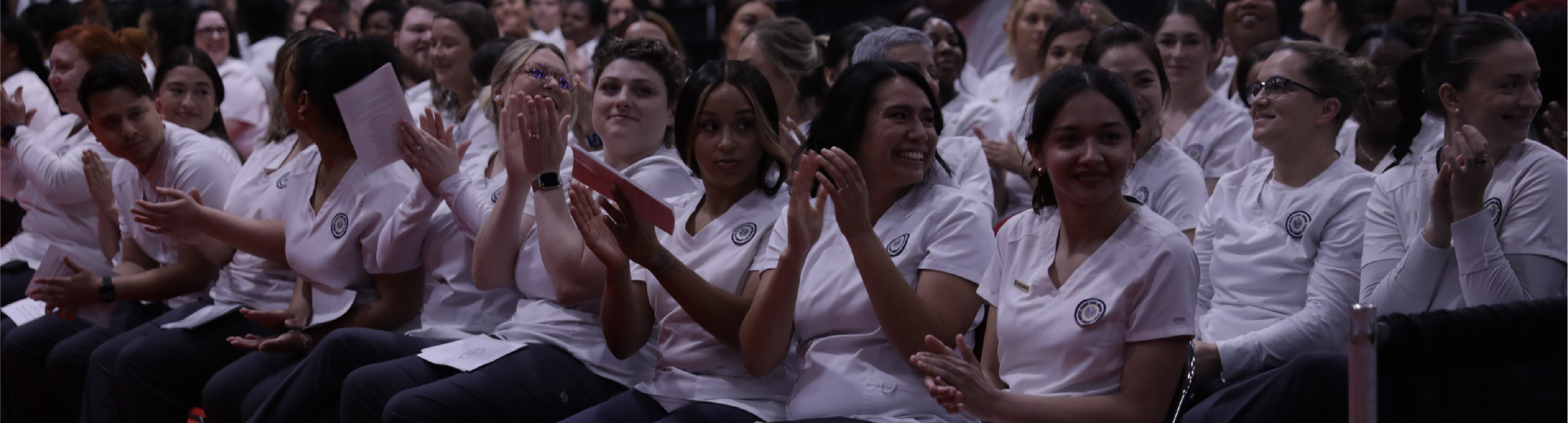 CNA Students applauding at convocation ceremony