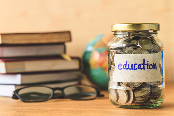 books with a jar of change