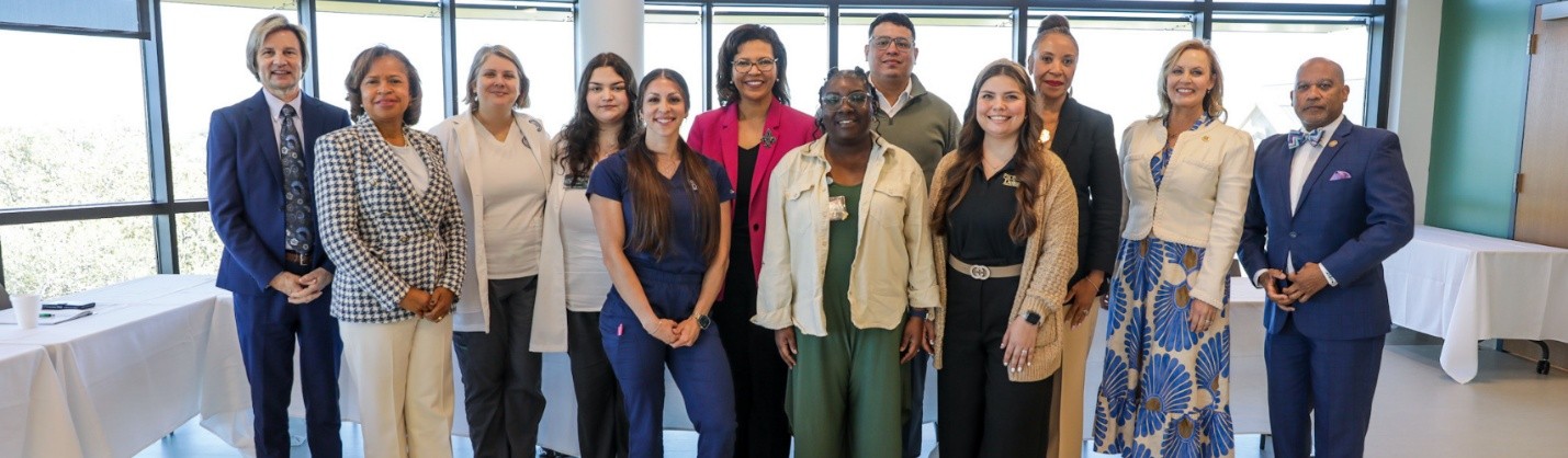 group picture of Board of Regents members and students