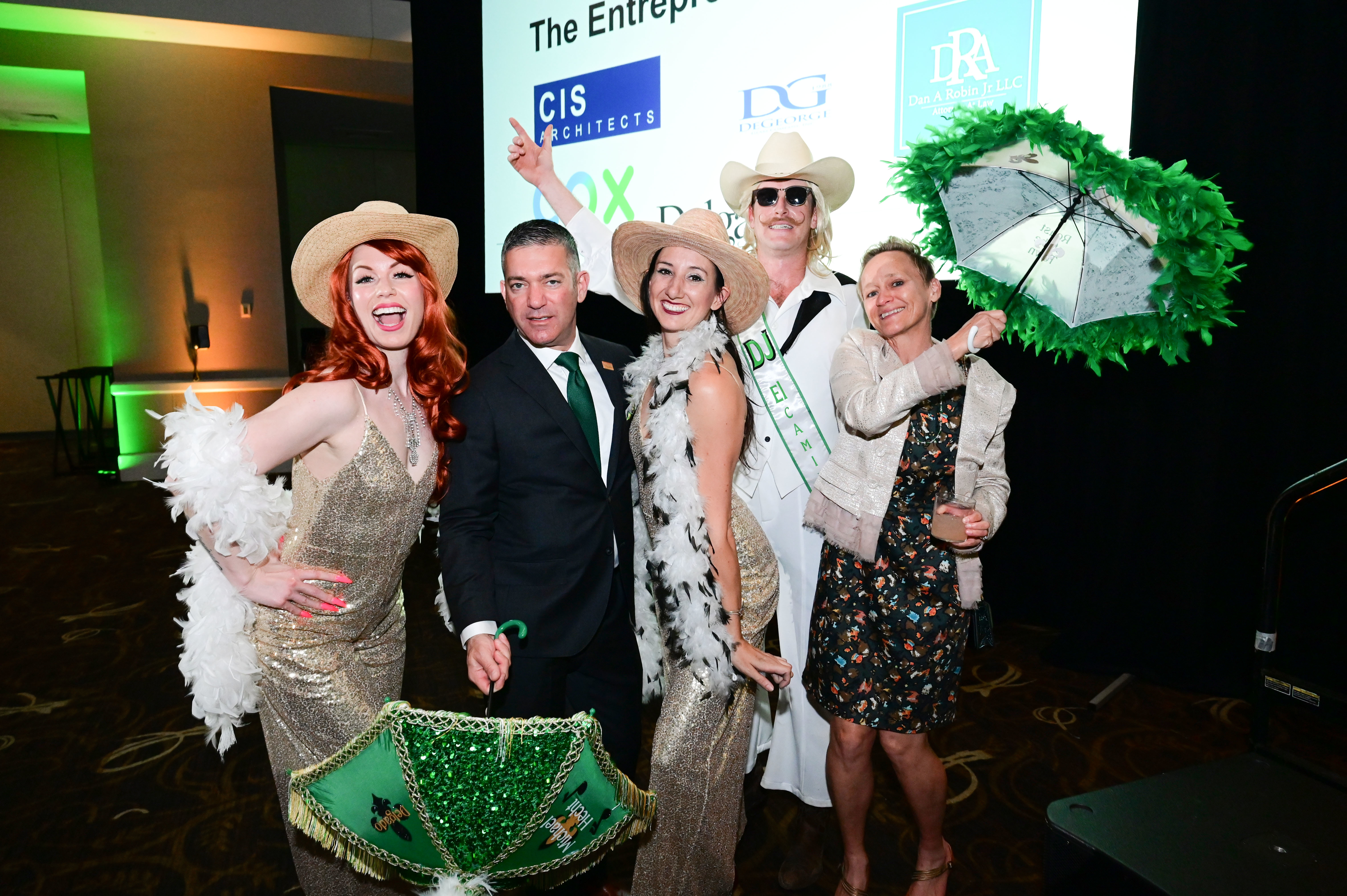Mr. and Mrs. Michael Hecht and some of the evening's entertainers
