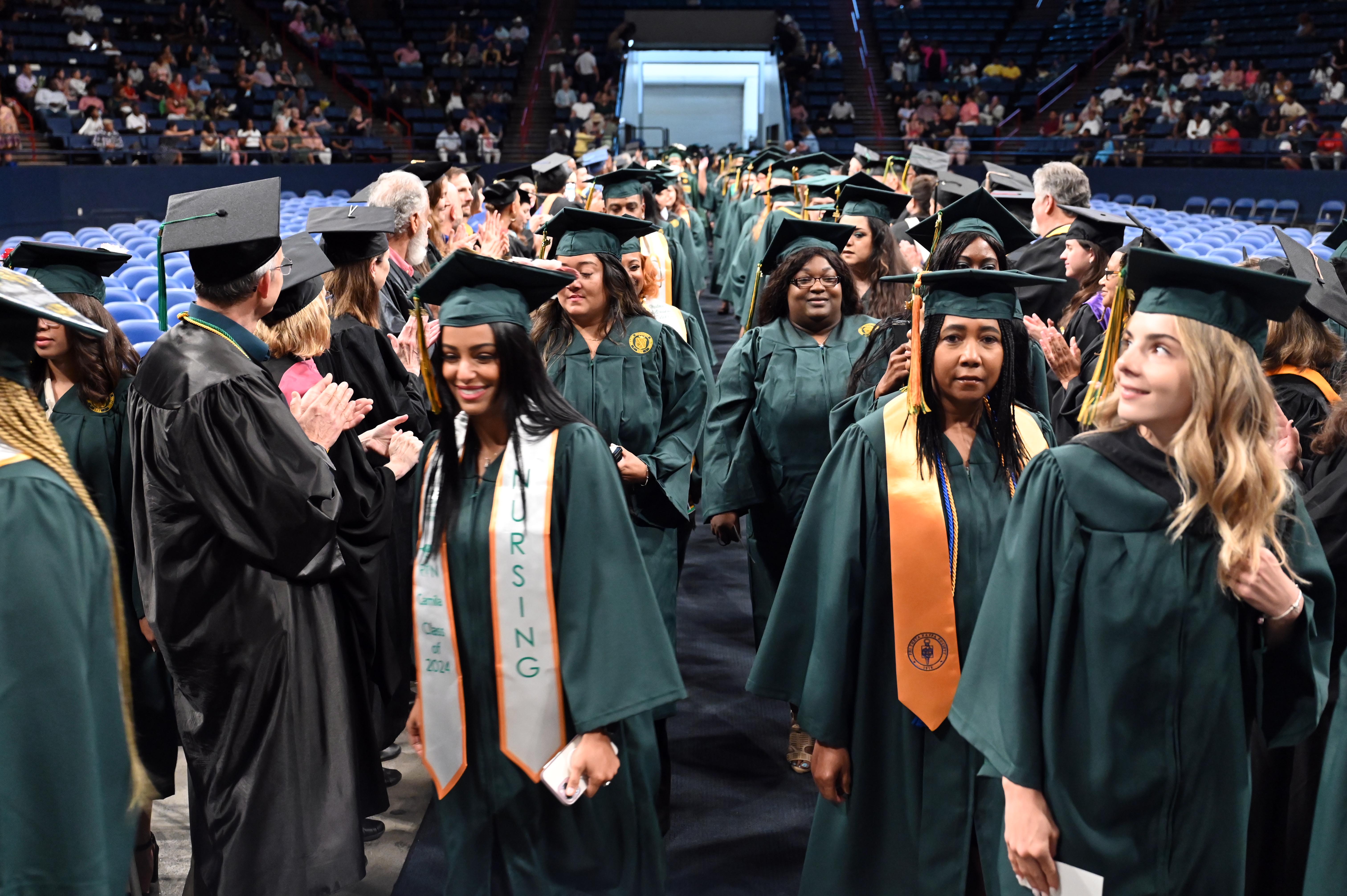 Graduates on the UNO Lakefront Arena floor