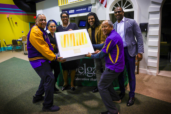 st aug high school members receiving apple computers