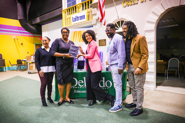 community members receiving apple computers