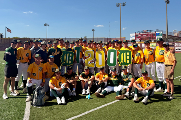 Team photo with players holding 