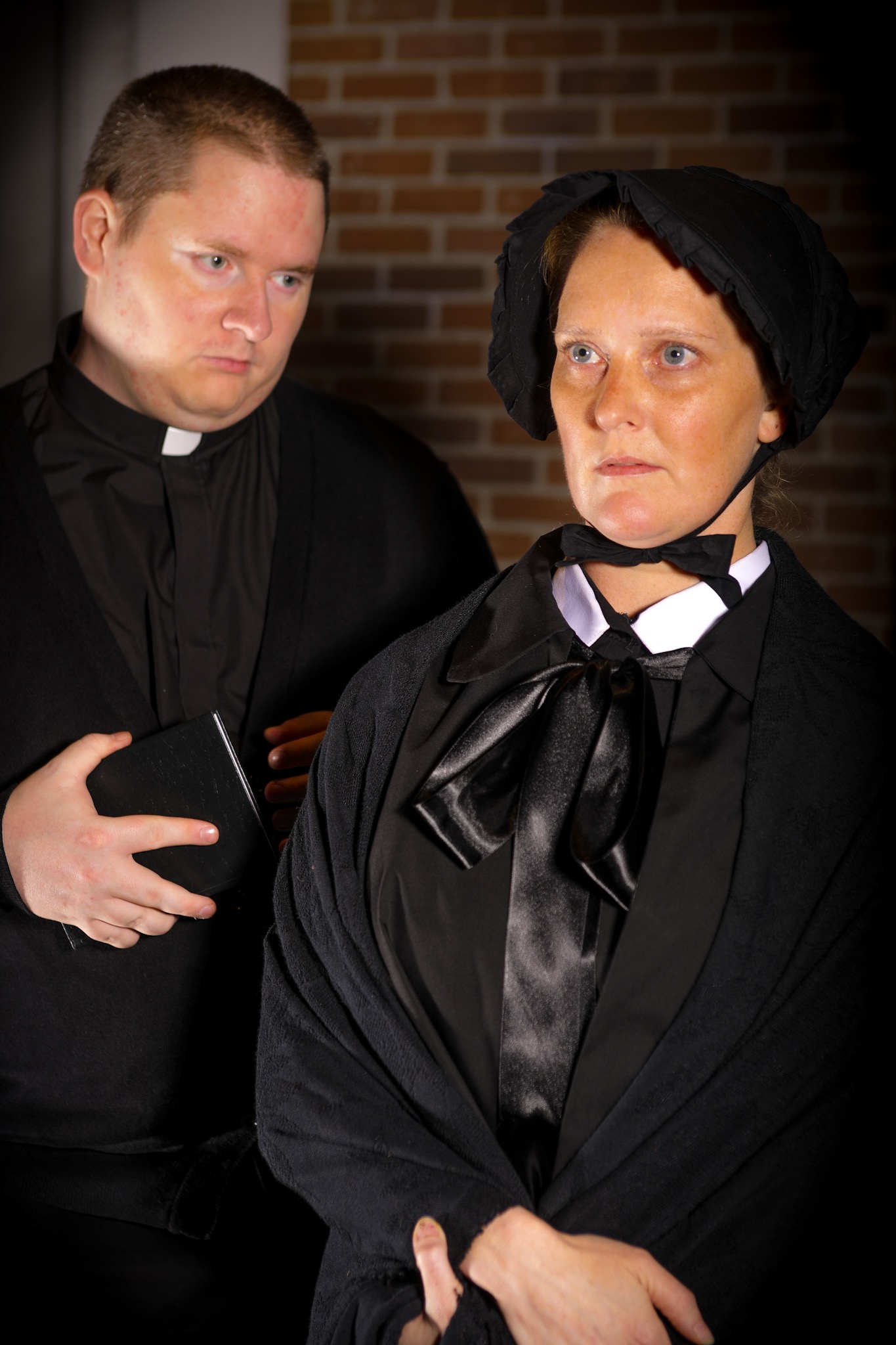 From left, Phillip Wattigney as Father Flynn and Meghan McDermott as Sister James in a scene from the Delgado Community College production of “Doubt” by John Patrick Shanley.