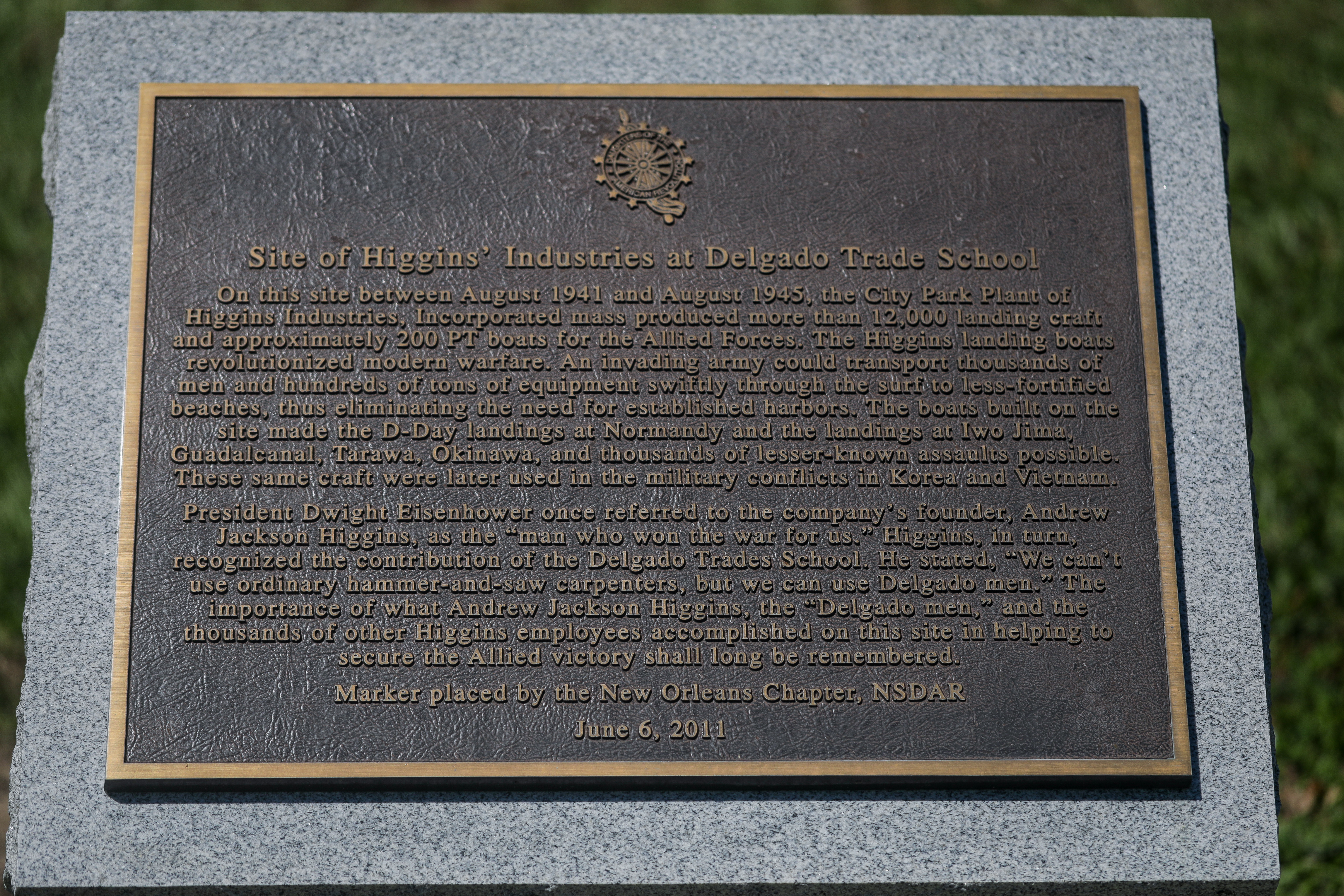 Photo of the monument outside building 37 on the City Park Campus