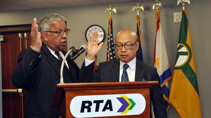 Orleans Parish Civil District Court Judge Kern A. Reese, left, swears in Dr. Mostofa Sarwar as a member of the RTA Board of Commissioners at ceremonies on November 13.