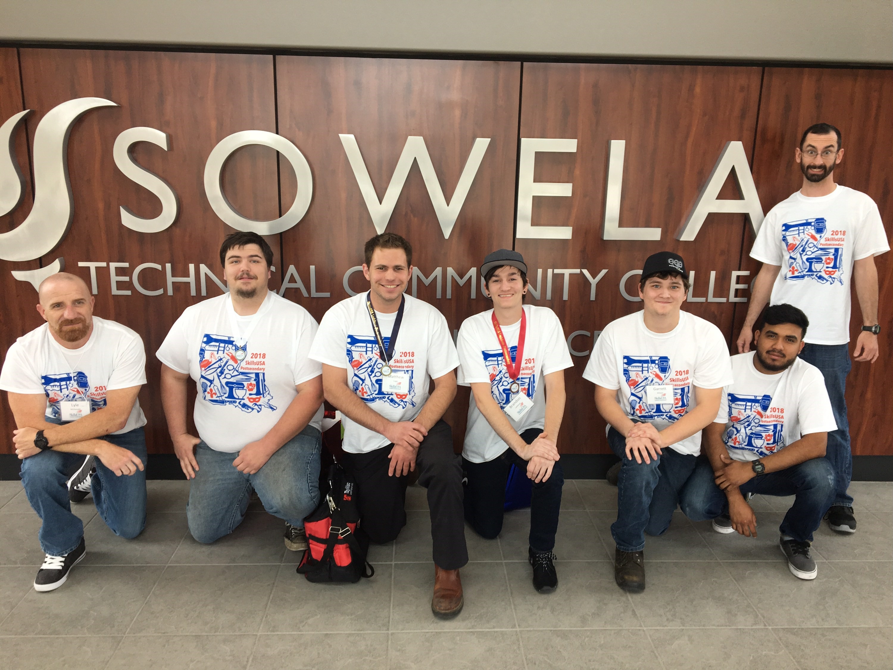 The six students representing the Delgado Community College Motor Vehicle Technology program at Louisiana SkillsUSA and their instructor, from left: Chris McDonald (Ford ASSET instructor/adviser), Juston Fruge (silver medalist/Ford ASSET student), Matthew Lugo (gold medalist/Ford ASSET student), Brandon Lefebvre (bronze medalist/Ford ASSET student), Garrett Wilson (Ford ASSET student), Michael Del Rio (GM ASEP student), Luther Miley (GM ASEP student). Not pictured, Andrew Gassen (general automotive student), Richard Vargas (general automotive instructor/adviser). 