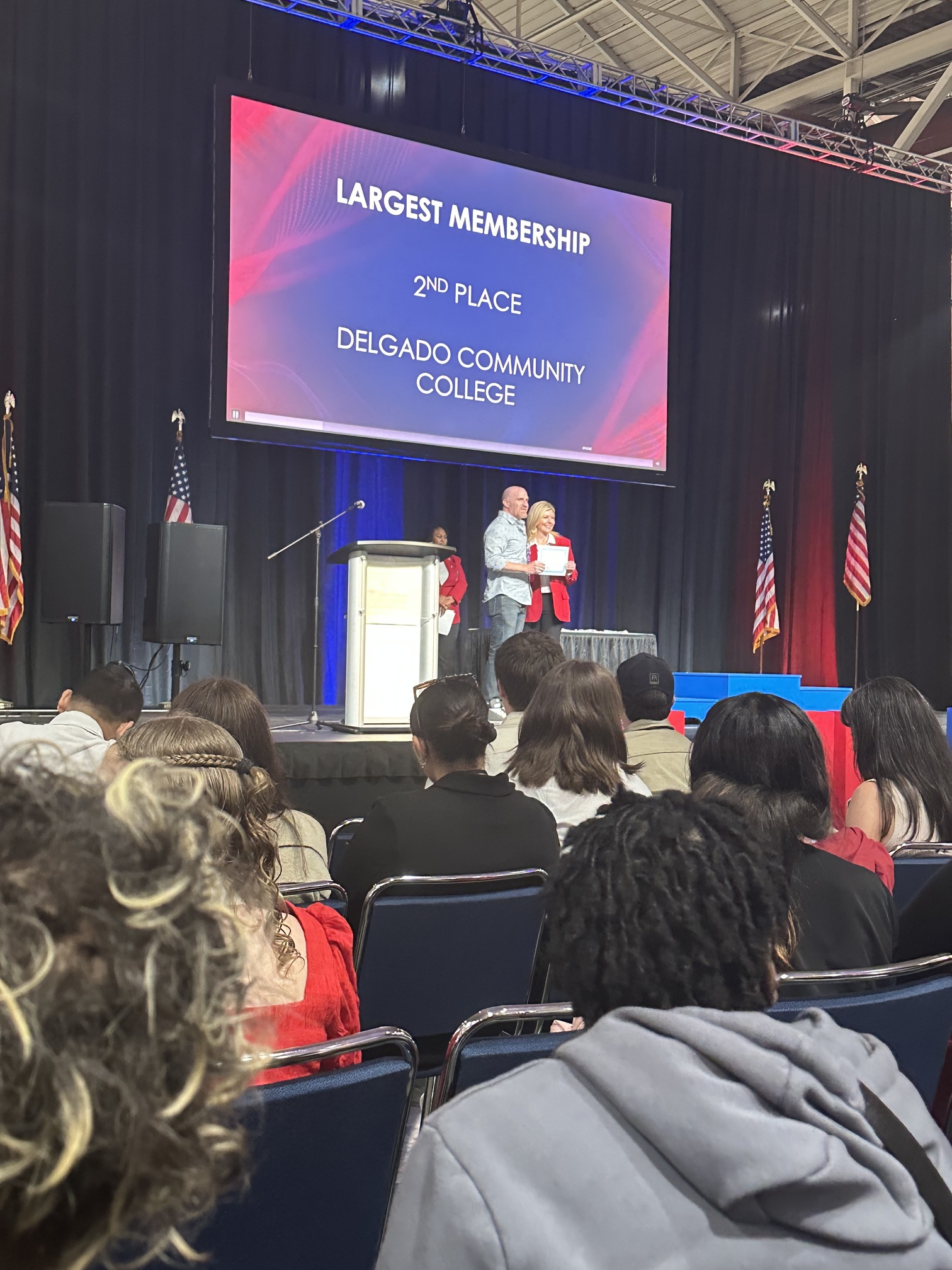 Delgado receives the second place award for largest membership