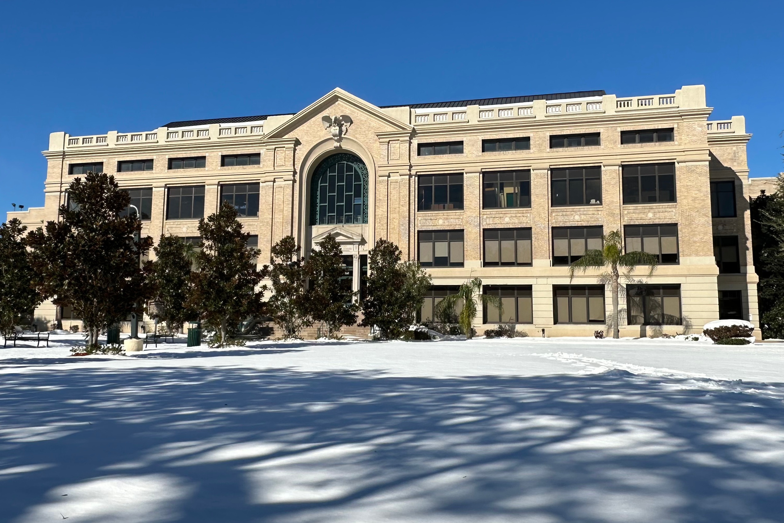 building 1 with snow on the ground