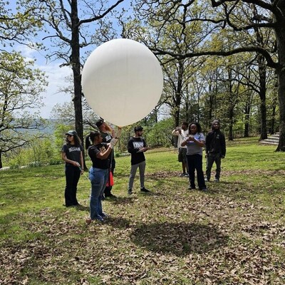Students prepare to launch an atmospheric balloon