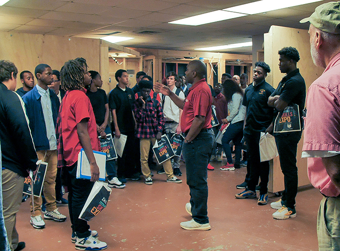 Delgado Electrician Instructor Leslie Falkins talks about careers with high school students visiting Delgado Jefferson for Technical Skills Expo 2018.