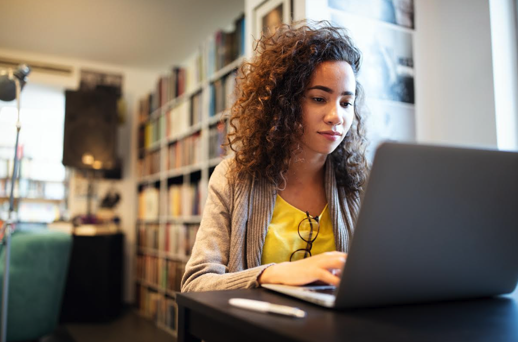 Student studying in a Library