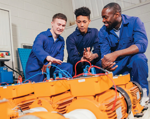 students practicing on a machine