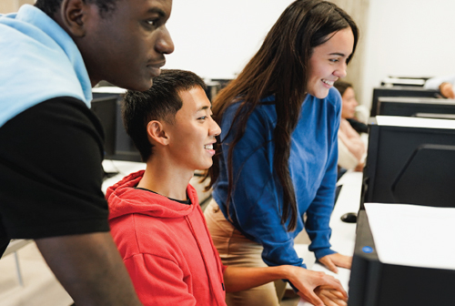 diverse group of students in a computer lab