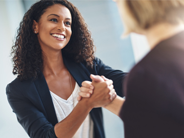 health coach shaking hands with a client