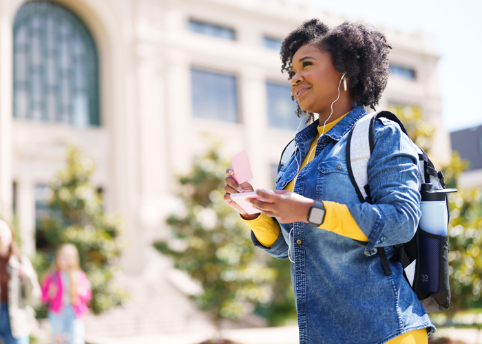 female student in front of building 1